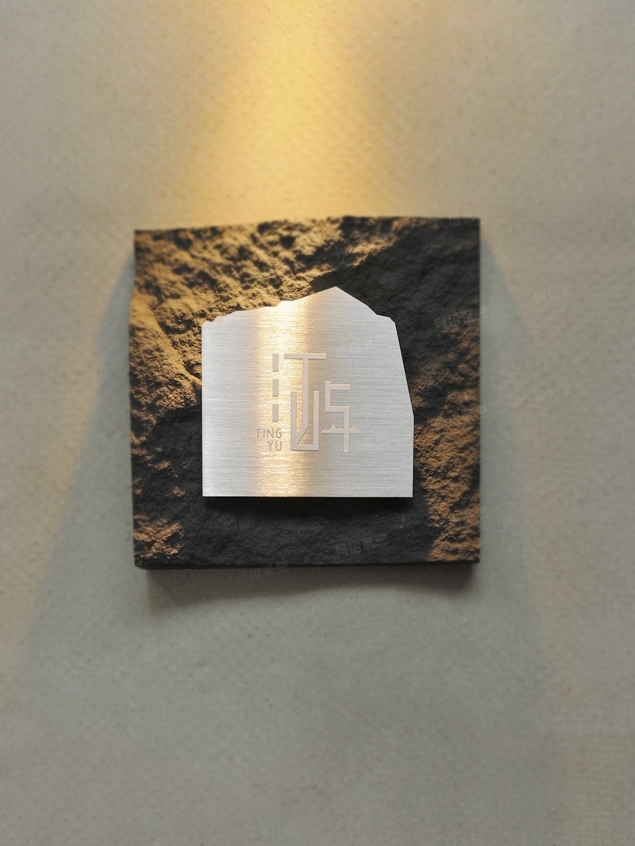 Texture detail of PU stone plaque under warm lighting