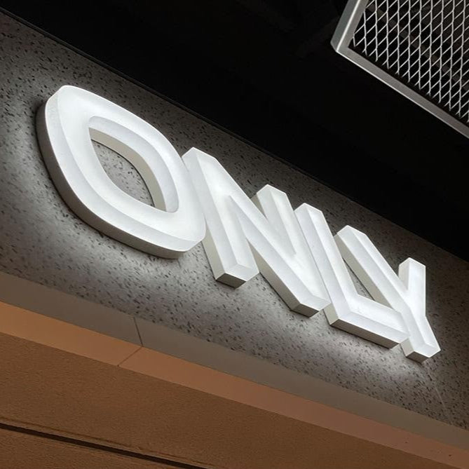 Custom 3D metal letters for office and boutique branding – wall-mounted logo signage by SignEdge